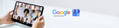 human hands holding laptop alongside the Google My Business logo