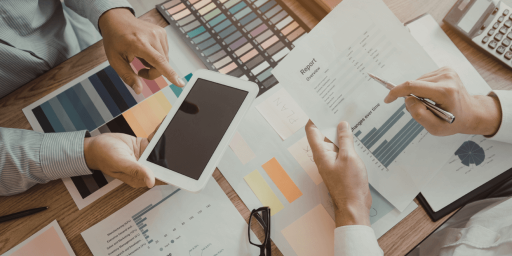 people looking at reports